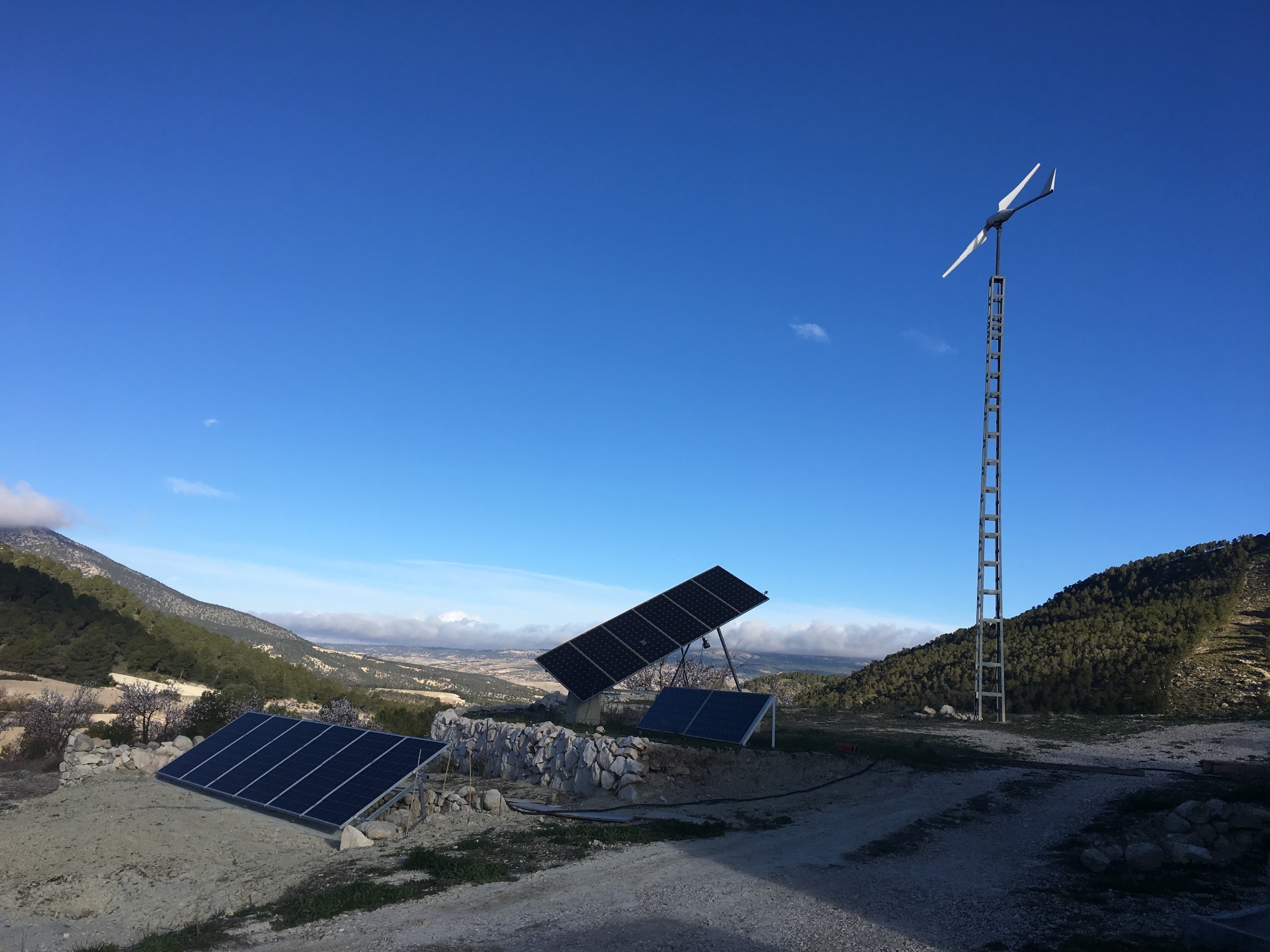 Solar panels and wind turbine at JOYA. 2018.